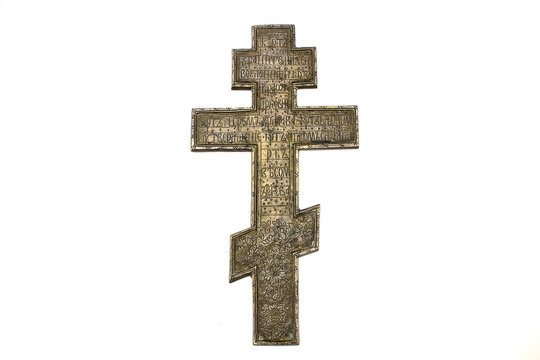 cross old orthodox copper on white isolated background