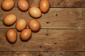 Easter eggs on a wooden table. View from above