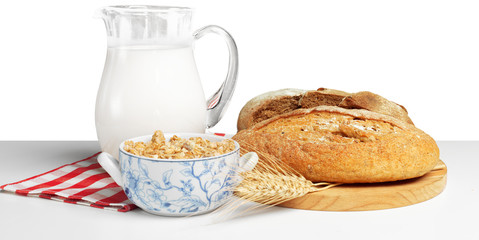 Bread and milk on the table
