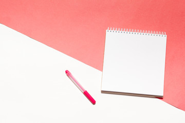 Open blank notebook on colorful background