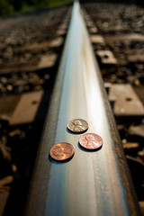 Pennies on a Train Track