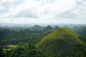 The Chocolate Hills is located in Bohol island, Philippines, where are  geological triangle formation. It's otherworldly field.