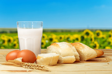 Bread and milk on the table