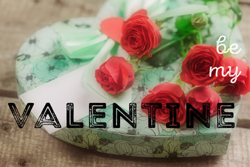 Roses and a hearts on wooden board, Valentines Day background
