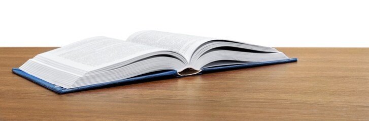 An Open Book on Table