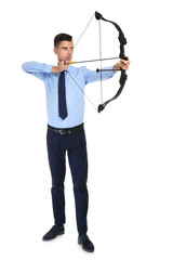 Young businessman practicing archery on white background © Africa Studio