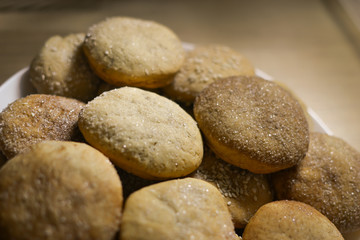 Fototapeta na wymiar Homemade cookies with sugar, cinnamon and sesame