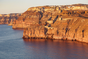 aerial view of the high rocky cliff at sunset