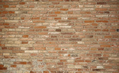 Naklejka premium large wall made with many red bricks
