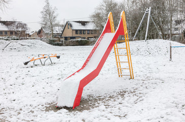 Playground in kindergarten for children in winter - Slide