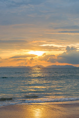 vertical photograph golden beautiful sunset and seascape in Krabi province, Thailand