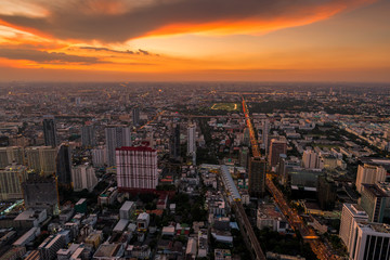 bright orange sunset over the city of Bangkok, Thailand