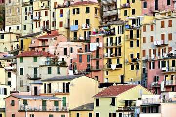 Fototapeta na wymiar Colourful houses of Manarola, Village of Cinque Terre, Italy