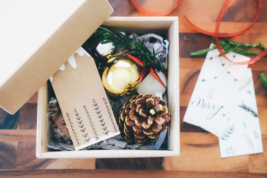 Preparation the Christmas vintage gift box on table.