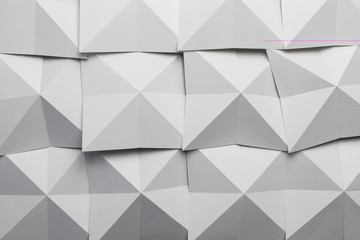 Composition of cards folded in geometric shapes,  abstract background