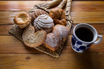 cup of coffee and mexican bread