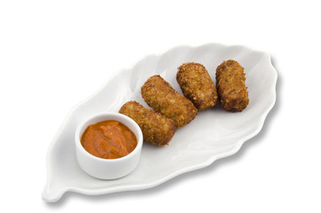 Vegetable croquettes in white plate on white background