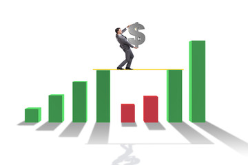 Fototapeta premium Young businessman in business concept with bar charts