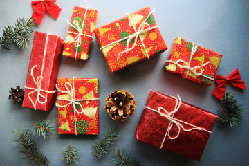 Christmas background with present and decorations.New Year / Top view of a gray background
