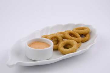  onion ring in white plate