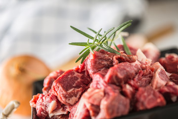 Beef. Raw sliced beef meat garlic onion salt pepper and rosemary