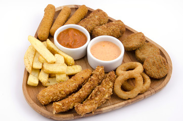 mixed snack fries on wood board