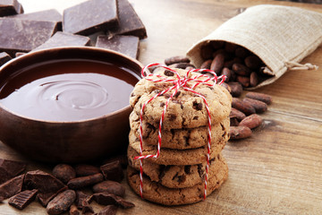 Chocolate cookies on wooden table. Chocolate chip cookies.
