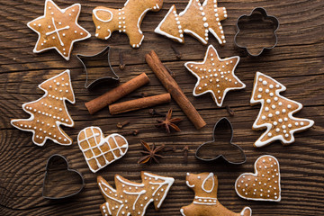 Christmas homemade gingerbread cookies on wooden background