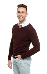 Handsome young man in bow tie on white background