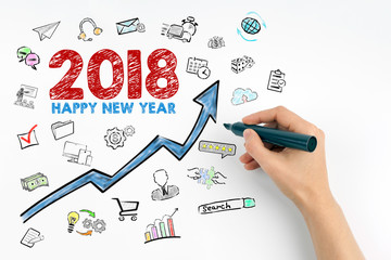 2018 Happy new year. Hand with marker writing.