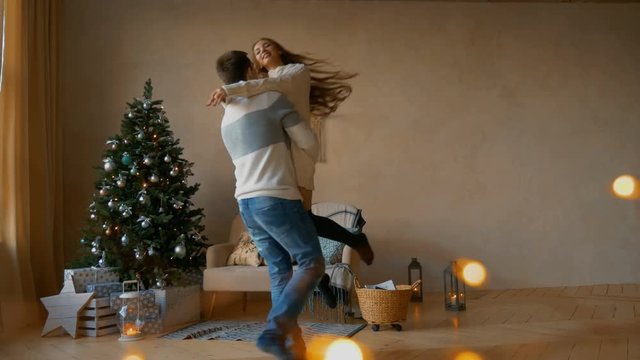 Young Attractive Couple on Christmas Evening