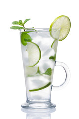 Alcohol coctail with ice, lime and mint isolated on white background