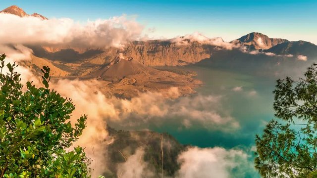 Timelapse flying through clouds above the crater of a volcano Rinjani in Lombok island, Indonesia