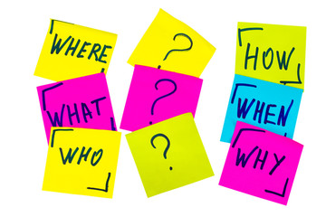 who, why, how, what, when and where questions - uncertainty, brainstorming or decision making concept, a set of isolated colorful sticky notes