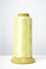 Spool of thread isolated on white background
