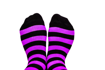 Fun colorful striped socks on isolated background