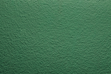 Green paint concrete plaster wall background.