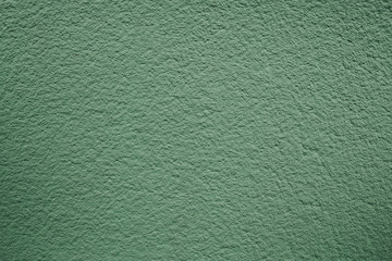 Green paint concrete plaster wall background.