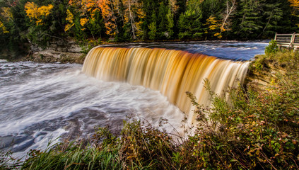 Scenic Michigan Autumn Waterfall Panorama. Upper Tahquamenon Falls  in the Paradise Newberry area of the Upper Peninsula in Michigan in Tahquamenon Falls State Park.
