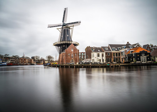 Beautiful windmill view from Haarlem city center on a cloudy day, Holland.