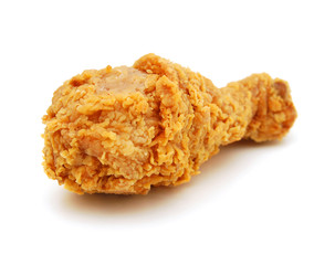 Golden brown fried chicken drumsticks