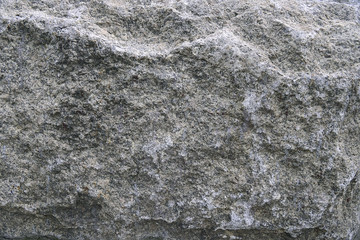 Grey granite rock background texture