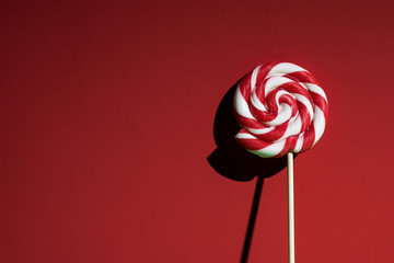 Isolated red and white lollipop