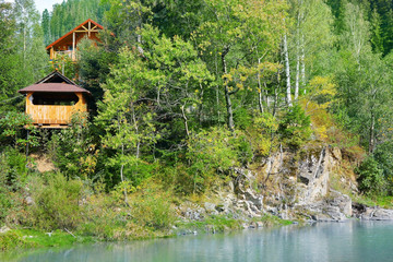 Fototapeta na wymiar Beautiful landscape with mountain river and houses