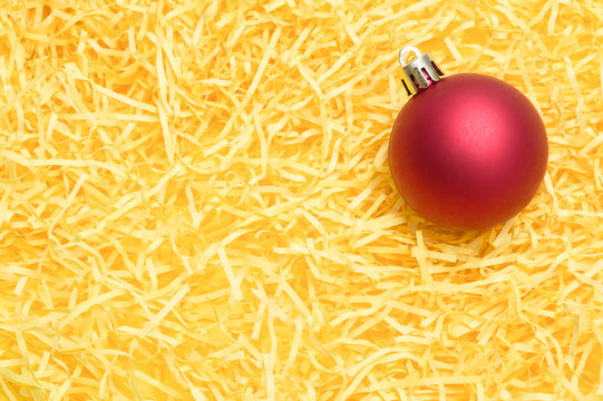 christmas ball on yellow background