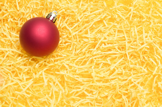 christmas ball on yellow background
