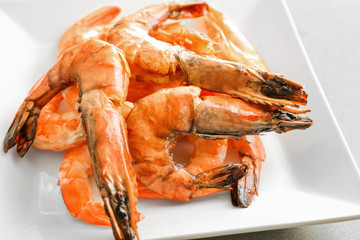 Delicious shrimps on plate, closeup