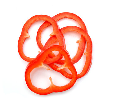 Red sweet bell pepper slices isolated on white background cutout
