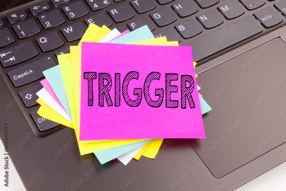 Fototapete writing trigger text made in the office close-up on laptop computer keyboard. business concept for s