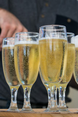 Sparkling wine in tall glasses